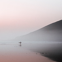 Buy canvas prints of A surfer walking along a misty beach by David Wall