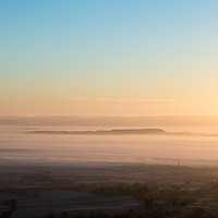 Buy canvas prints of Mist covering the English countryside on a cold wi by David Wall