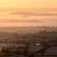 Buy canvas prints of Winter sunrise over the countryside. by David Wall