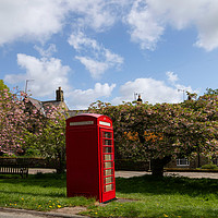 Buy canvas prints of Small Rural Post Box Next to a Red Phone Box. by Steven Gill