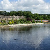 Buy canvas prints of Cottages and Gardens Along a River Bank. by Steven Gill