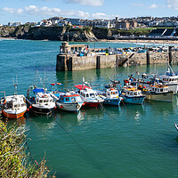 Buy canvas prints of Boats lined up at Newquay Harbour  by Tony Twyman