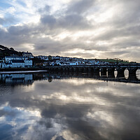 Buy canvas prints of Moody clouds over Bideford Town by Tony Twyman