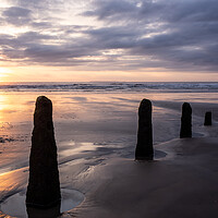 Buy canvas prints of Weathered Groynes at Sunset by Tony Twyman