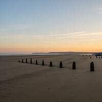 Buy canvas prints of Serene Sunrise on a Deserted Beach by Tony Twyman