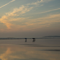Buy canvas prints of Surfers heading out to sea at Westward Ho in Devon by Tony Twyman