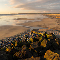 Buy canvas prints of Sunset lighting up Westward Ho! beach in Devon by Tony Twyman