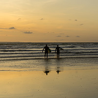 Buy canvas prints of sunset surfers at Westward Ho in North Devon by Tony Twyman