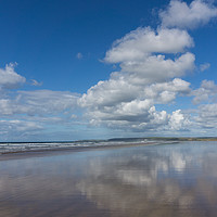Buy canvas prints of Clouds reflecting on a deserted Westward Ho beach by Tony Twyman