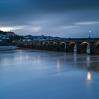 Buy canvas prints of Moody sunrise at Bideford Long Bridge in Devon by Tony Twyman