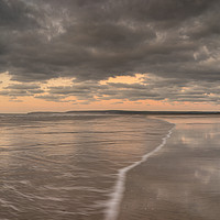 Buy canvas prints of A cloudy sunset at Westward Ho! by Tony Twyman