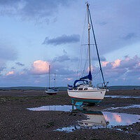 Buy canvas prints of yachts moored on Instow beach at dusk by Tony Twyman