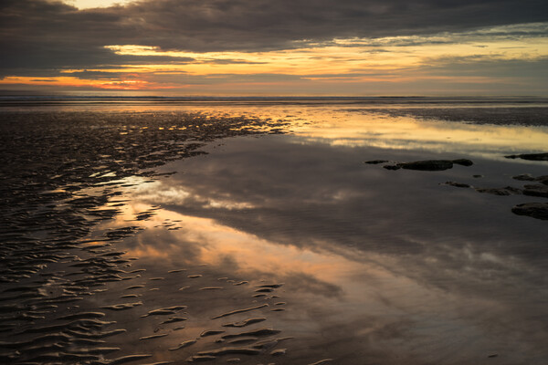 Moody sunset reflections Picture Board by Tony Twyman