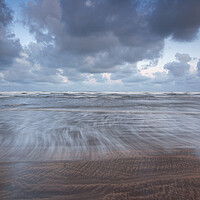 Buy canvas prints of Windy sunrise at Westward Ho beach by Tony Twyman