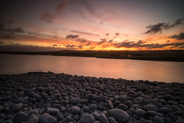 Sunrise on the Pebbles Picture Board by Tony Twyman