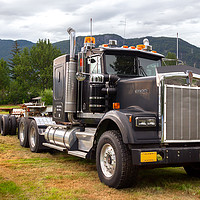 Buy canvas prints of A Truck Kenworth W900 parked on a field over mount by RUBEN RAMOS