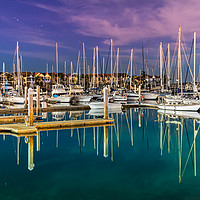 Buy canvas prints of Sailboats moored on a peaceful bay at night. by RUBEN RAMOS