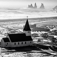 Buy canvas prints of The Church in Vik, Iceland. by Tony Williams. Photography email tony-williams53@sky.com