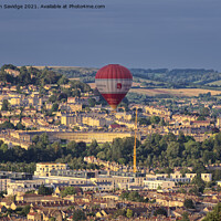 Buy canvas prints of Hot air balloon passes Bath's famous Royal Crescent  by Duncan Savidge