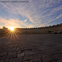 Buy canvas prints of sun star over the cobbles of Bath's Royal Crescent by Duncan Savidge