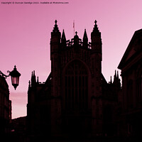 Buy canvas prints of Red pink silhouette of Bath Abbey by Duncan Savidge