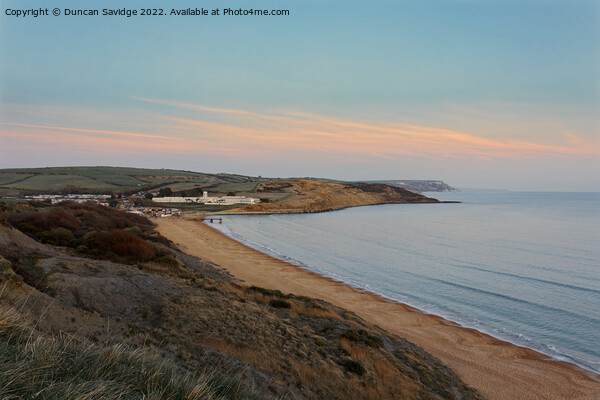 Sunset at Bowleaze Cove Weymouth Picture Board by Duncan Savidge