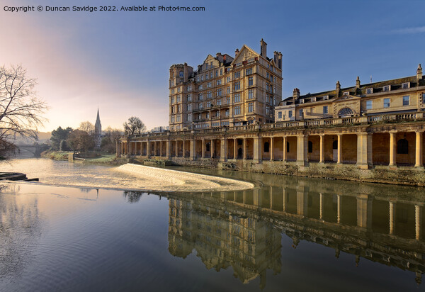 Empire hotel in Bath reflected in the River Avon early morning Picture Board by Duncan Savidge