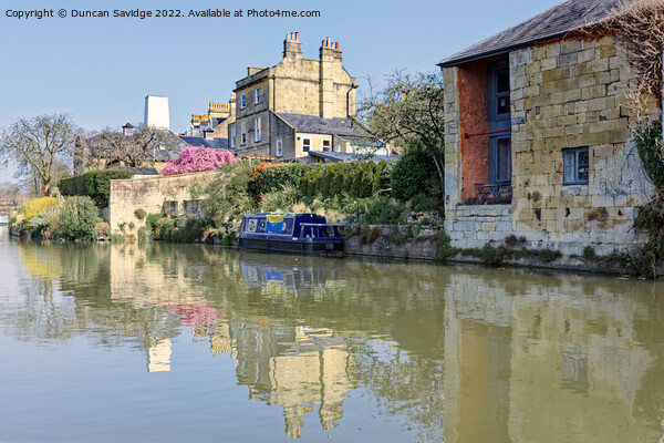 Kennet and Avon Canal, Bath, reflected in the Spring sunshine Picture Board by Duncan Savidge