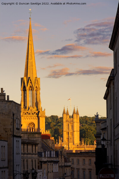 Last light catches St Michael's Church and the Bath Abbey Picture Board by Duncan Savidge