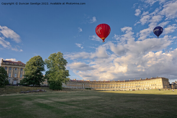Hot air balloons drift across the Royal Crescent  Picture Board by Duncan Savidge