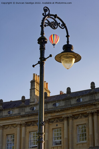 Striped hot air balloon framed over Bath at the Circus  Picture Board by Duncan Savidge