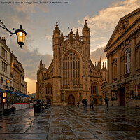 Buy canvas prints of Bath Abbey at sunset after a rain storm  by Duncan Savidge