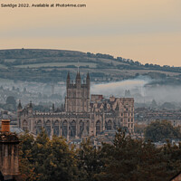 Buy canvas prints of Moody early morning mist rising behind Bath Abbey by Duncan Savidge