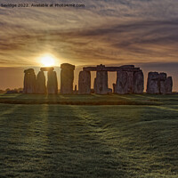 Buy canvas prints of Stonehenge Winter Sunset sun stripes  by Duncan Savidge