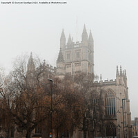Buy canvas prints of Bath Abbey in the fog by Duncan Savidge