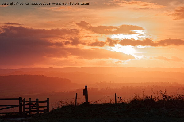 Hazy sunset looking towards the Mendips Picture Board by Duncan Savidge