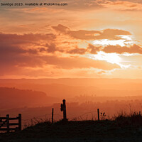 Buy canvas prints of Hazy sunset looking towards the Mendips by Duncan Savidge