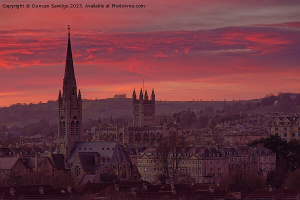 Pink sunset across the City of Bath skyline Picture Board by Duncan Savidge
