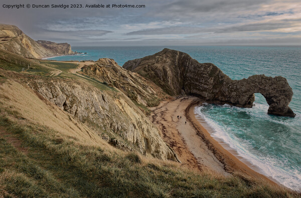 Durdle Door, Dorset with Man O'War beack in the background  Picture Board by Duncan Savidge