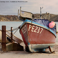 Buy canvas prints of Fishing boat at Lulworth Cove by Duncan Savidge