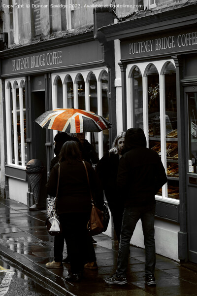 Pulteney Bridge coffee shop in the rain Picture Board by Duncan Savidge