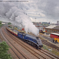 Buy canvas prints of A4 steam train leaving Bristol Temple Meads by Duncan Savidge