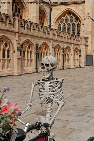 Skelton in front of Bath Abbey Picture Board by Duncan Savidge