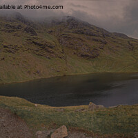 Buy canvas prints of Moody panoramic of Low Water, Coniston by Duncan Savidge