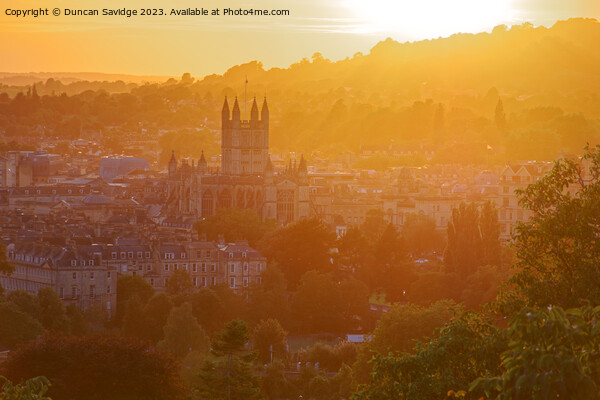 The city of Bath illuminated by golden sun Picture Board by Duncan Savidge