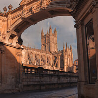 Buy canvas prints of Bath Abbey framed by York Street Archway by Duncan Savidge