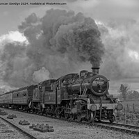 Buy canvas prints of 4110 and Ex LMS Ivatt 2MT Class 2-6-0, No.46447 steam trains go back to back in black and white by Duncan Savidge