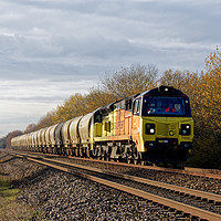 Buy canvas prints of Colas freight train at speed 'tanks' by Duncan Savidge