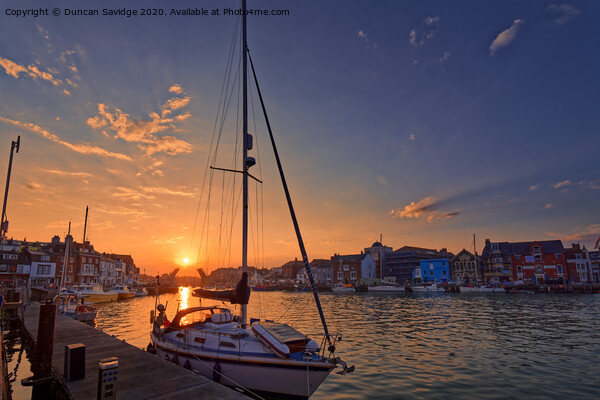 Weymouth harbour sunset Picture Board by Duncan Savidge