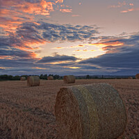 Buy canvas prints of Harvest / hay bale sunset portrait  by Duncan Savidge